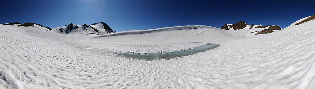 P005234: Large panoramic image Mountain lake with a magic melting water ring