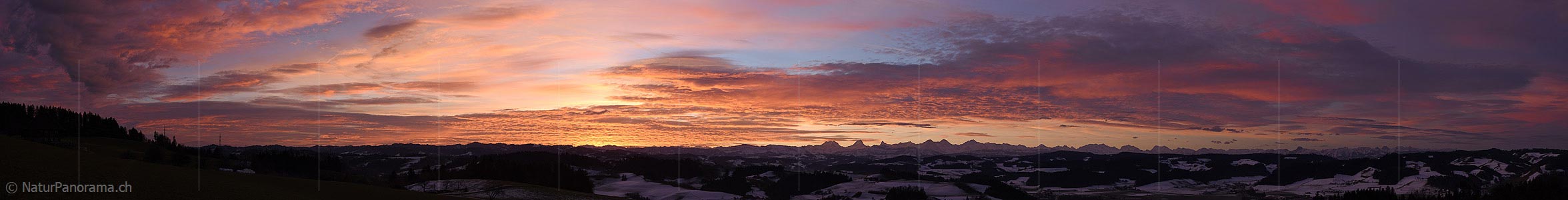 P017399: Panoramic photo Early morning with glowing clouds in the sky