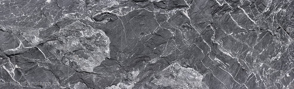 P023460: Panoramafoto Strukturen auf hellgrauem Felsblock