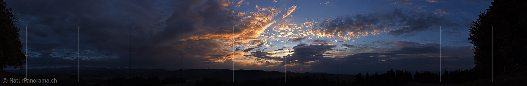 P024633: Panoramic photo Glowing clouds in the evening sky