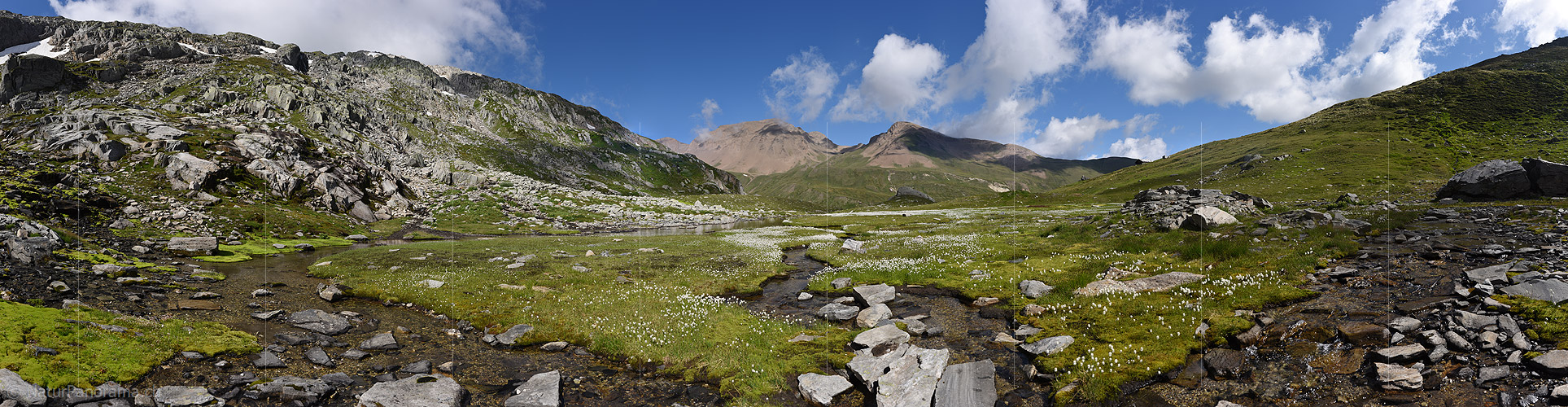P020153: Gigapixel panoramic photo of a green natural landscape with loose source clouds in the sky