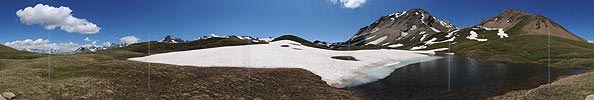 Panoramic photo Nordic landscape with mountain lake on the Saflisch Pass