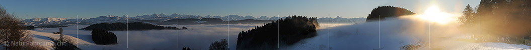 Panoramic image winter landscape with sea of fog