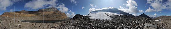 Panoramic picture of mountain scenery with lake and glacier