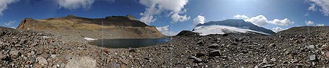 Panoramic picture of a lake in a stone field
