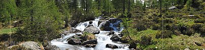 Panorama photo Stepped mountain stream in natural landscape
