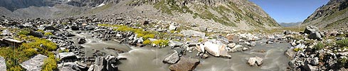 Panoramic picture mountain brook in high valley (long time exposure)