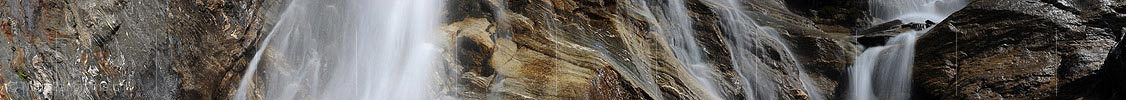 Panoramic image Stratified rock and water (long exposure)