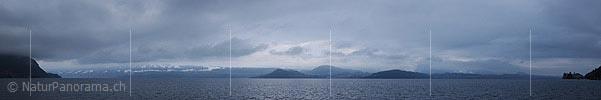 Panoramic image Mystic atmosphere above the lake Thun.
