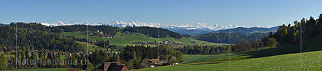 Panorama with the Alps and a castle from Emmental
