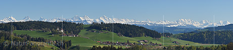 Panorama with the Alps and a castle from Emmental