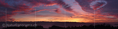 Panorama Artfully formed glowing clouds in the evening sky