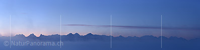 Panorama photo Bernese Alps through fine morning fog