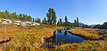 Panoramic photo of a moorland lake in an unspoilt landscape
